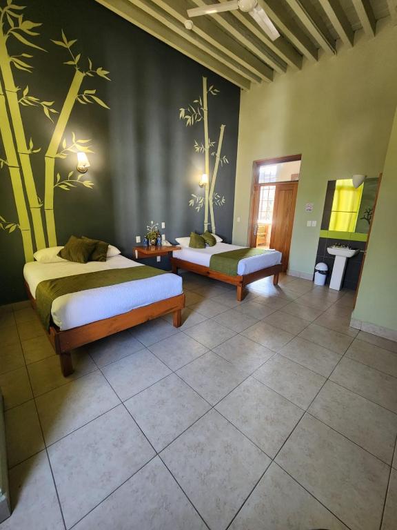 Double room with two double beds at Hotel Plaza Querétaro